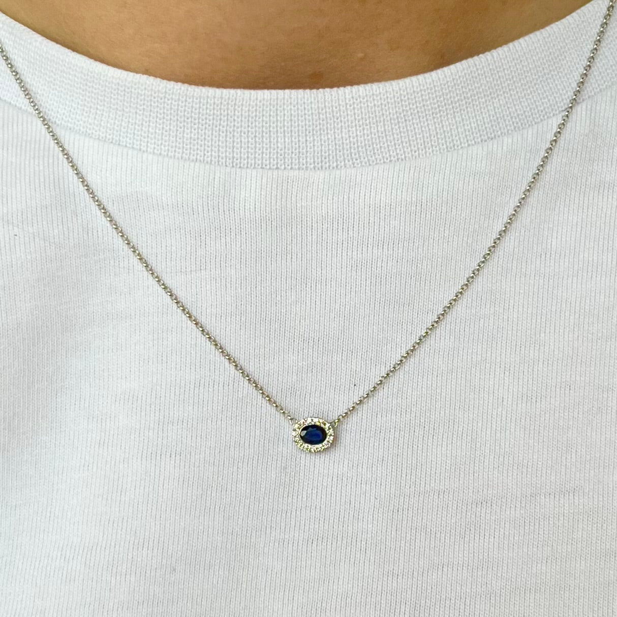 Oval Sapphire and Diamond Halo Necklace in 9ct White Gold