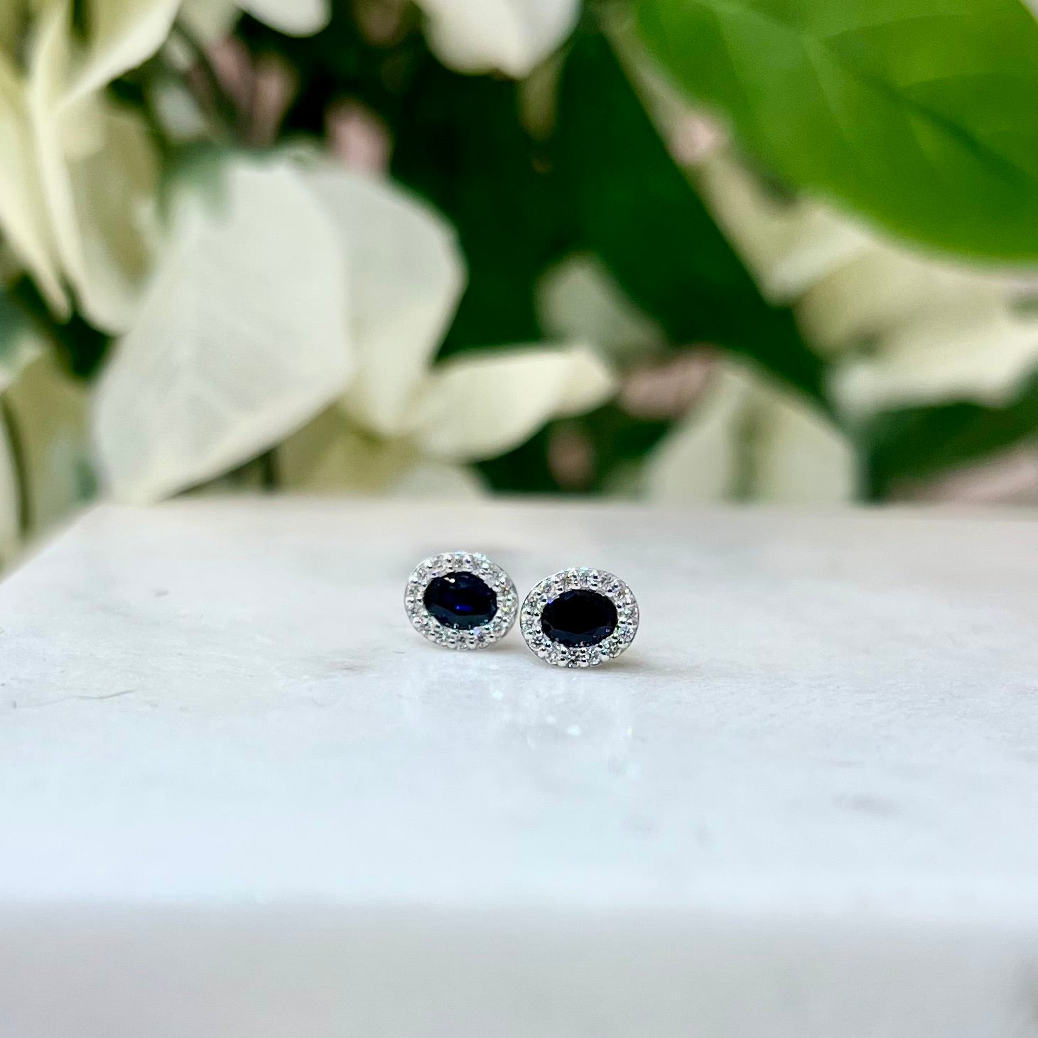 Oval Sapphire and Diamond Halo Stud Earrings in 9ct White Gold