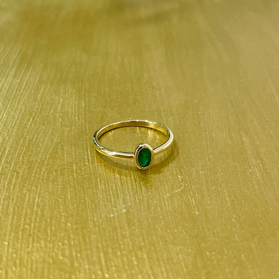 Modern Bezel Set Emerald Solitaire Ring in Yellow Gold