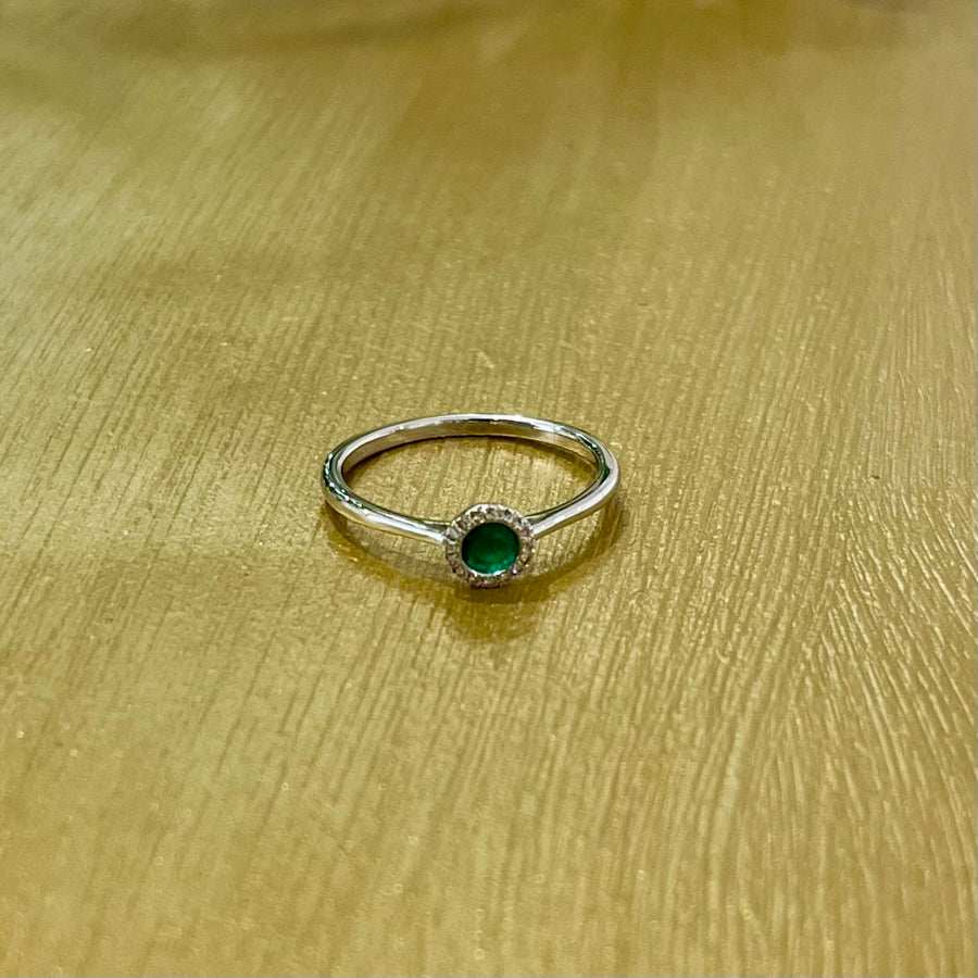 Modern Emerald and Diamond Halo Ring