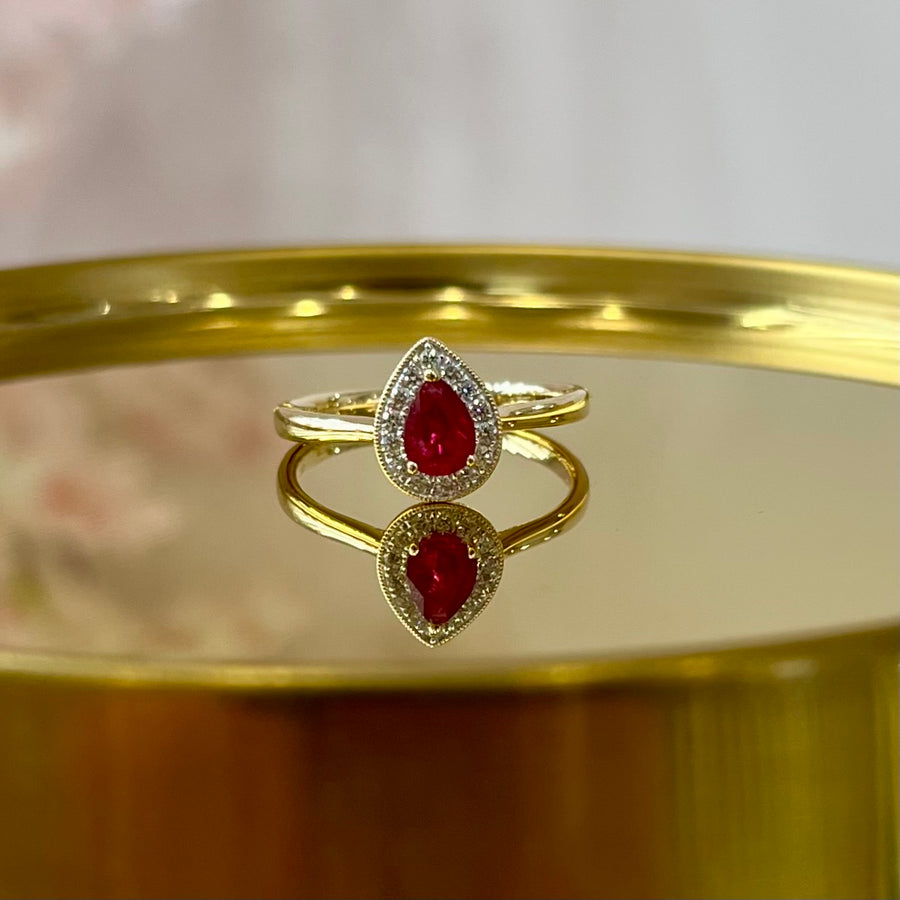 Pear Ruby & Diamond Halo Ring in 9ct Yellow Gold