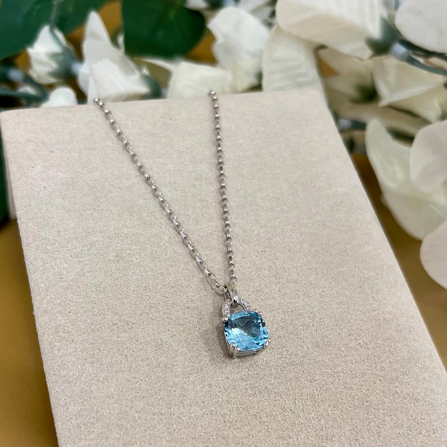 Cushion Cut Blue Topaz and Diamond Pendant in 9ct White Gold