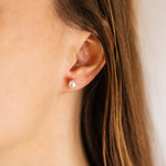 These staple simple pearl ball stud earrings are an everyday staple on their own or perfect for completing your ear stack.  925 Sterling Silver. E1025/3,4,5,6