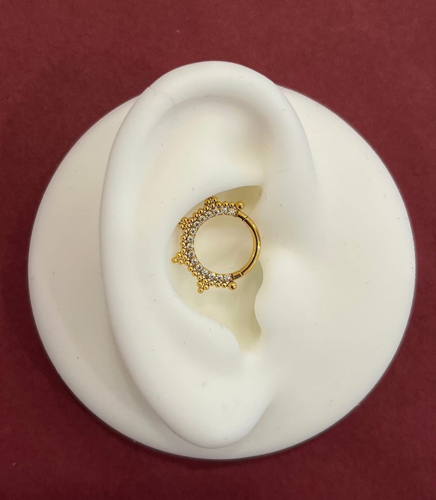 PVD gold pàve crystal with trinity bead clicker ring