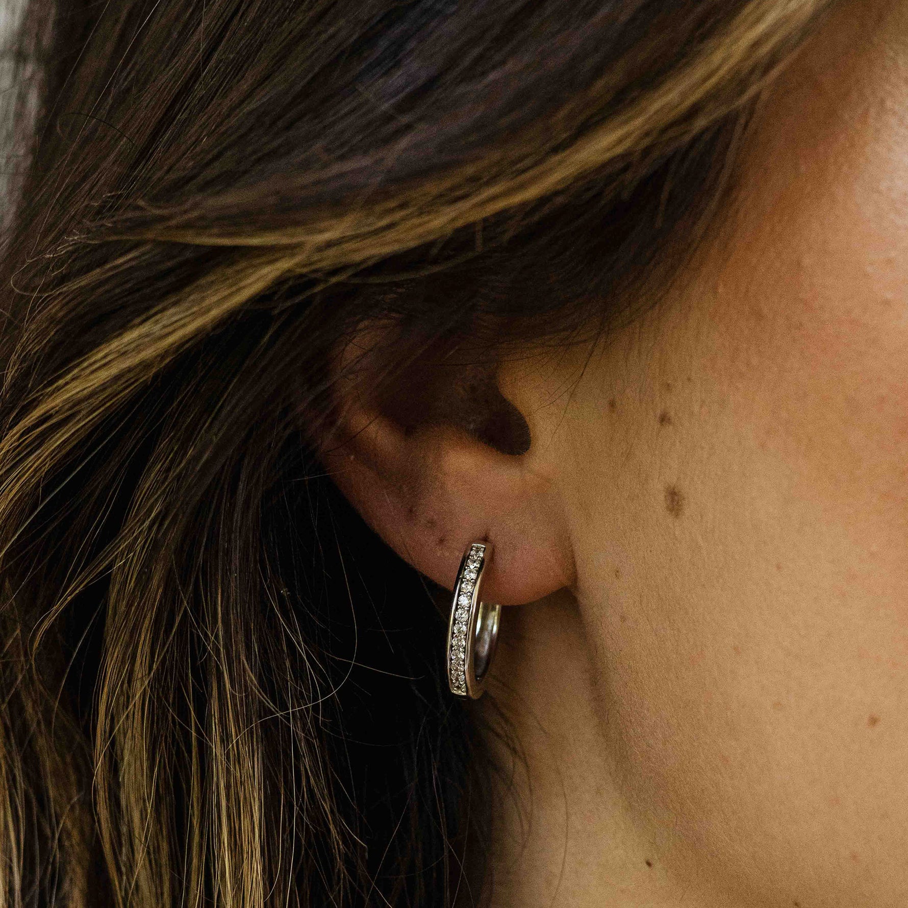 Medium sparkle hoop huggie style earring. 925 Sterling Silver and 18ct Gold Plated.