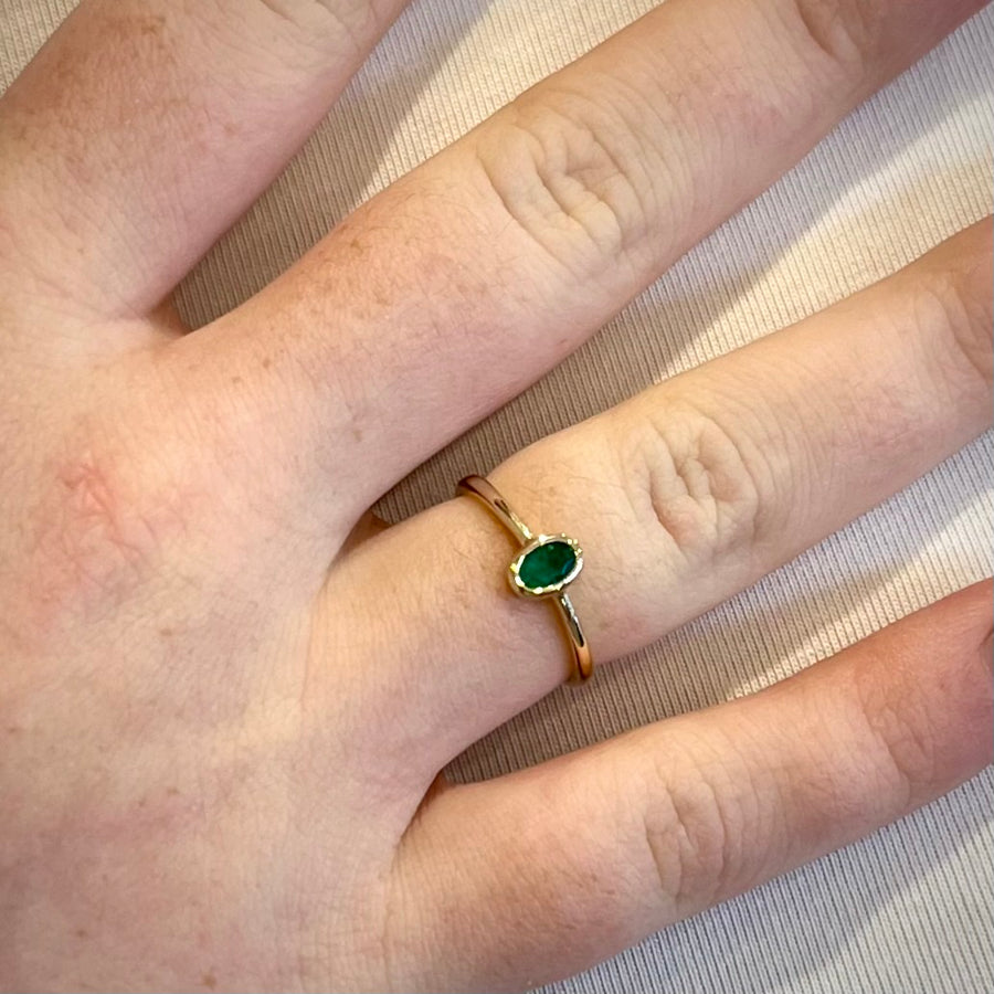 Modern Bezel Set Emerald Solitaire Ring in Yellow Gold