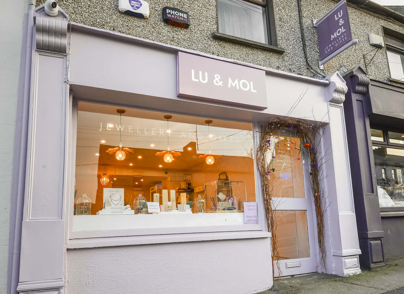 the front of a pink, purple and white jewellery story called Lu and Mol