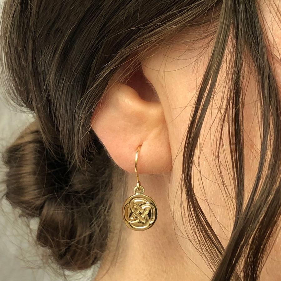 dara knot earrings in 9ct gold by liwu jewellery 